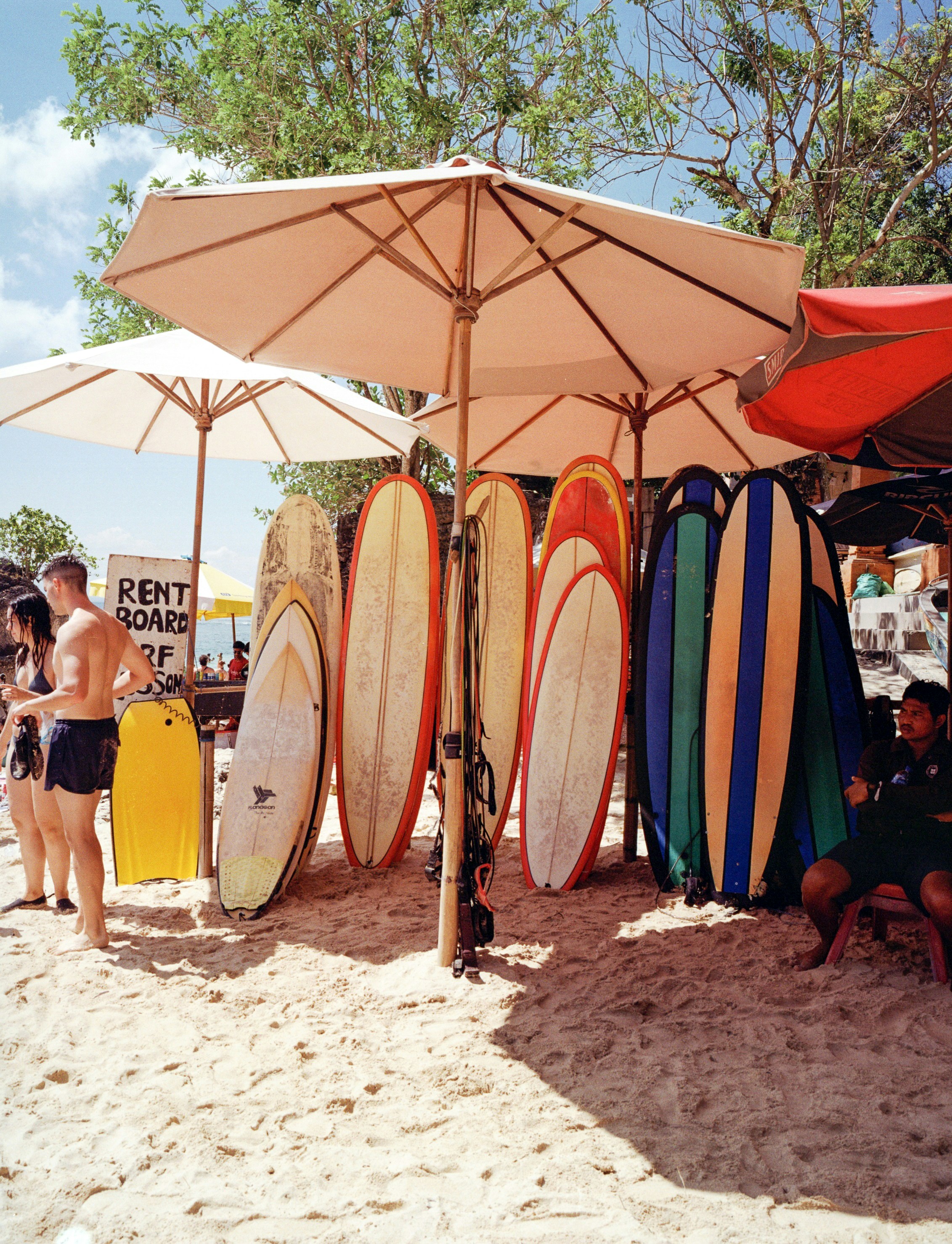 Surfboard rental rack at a beach surf stay in Portugal